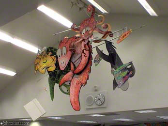 Three dimensional mobile of colorful sea creatures looking down at students 
