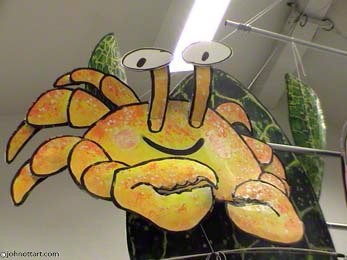 Crabby a gold and glittery crab is part of this batik styled mobile