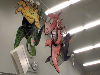 whimsical hanging mobile is what students see in this library
